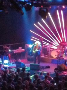 Jim James on the stationary Flying V guitar.